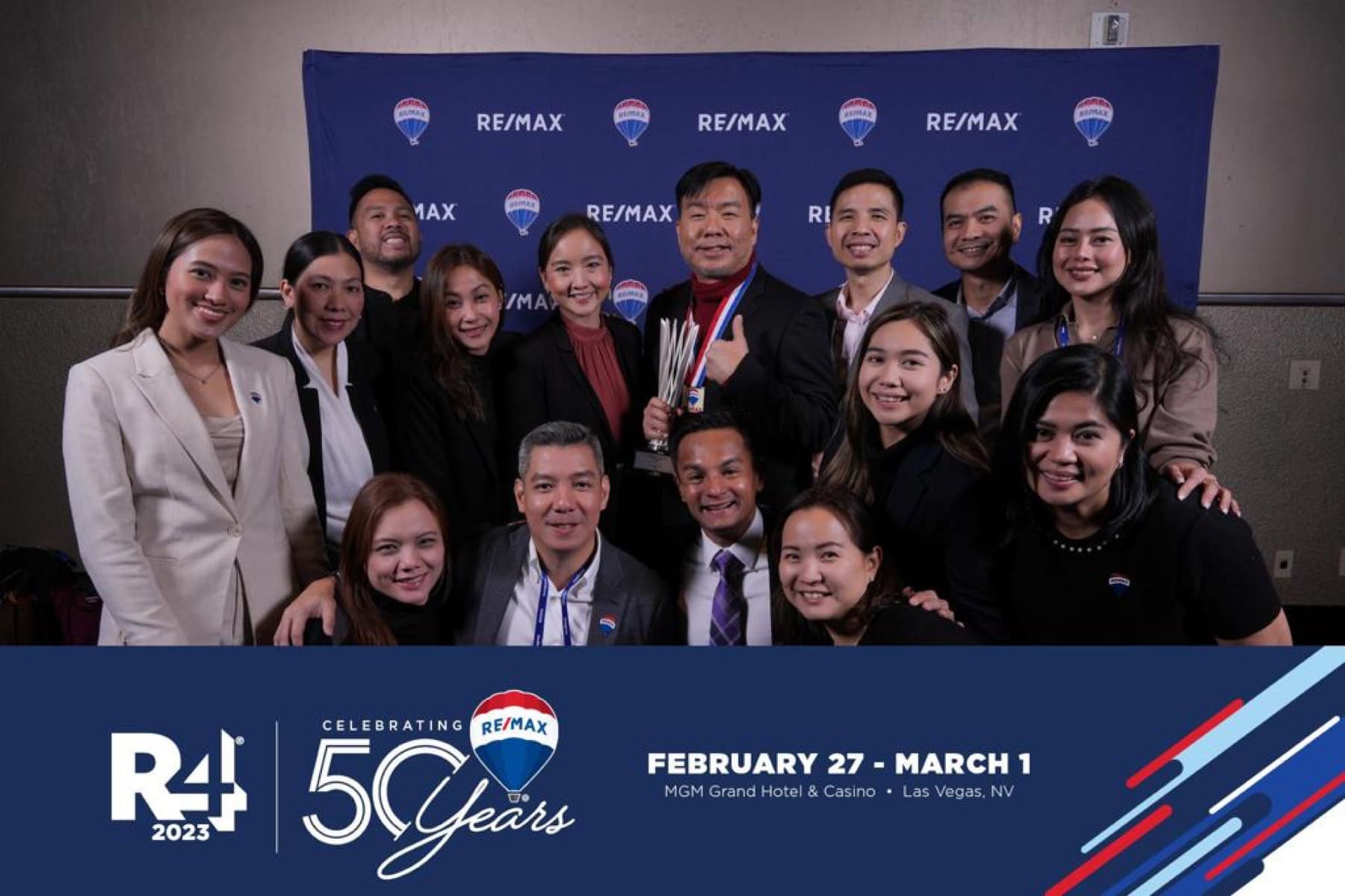 Exquisite Properties professionals at a RE/MAX event