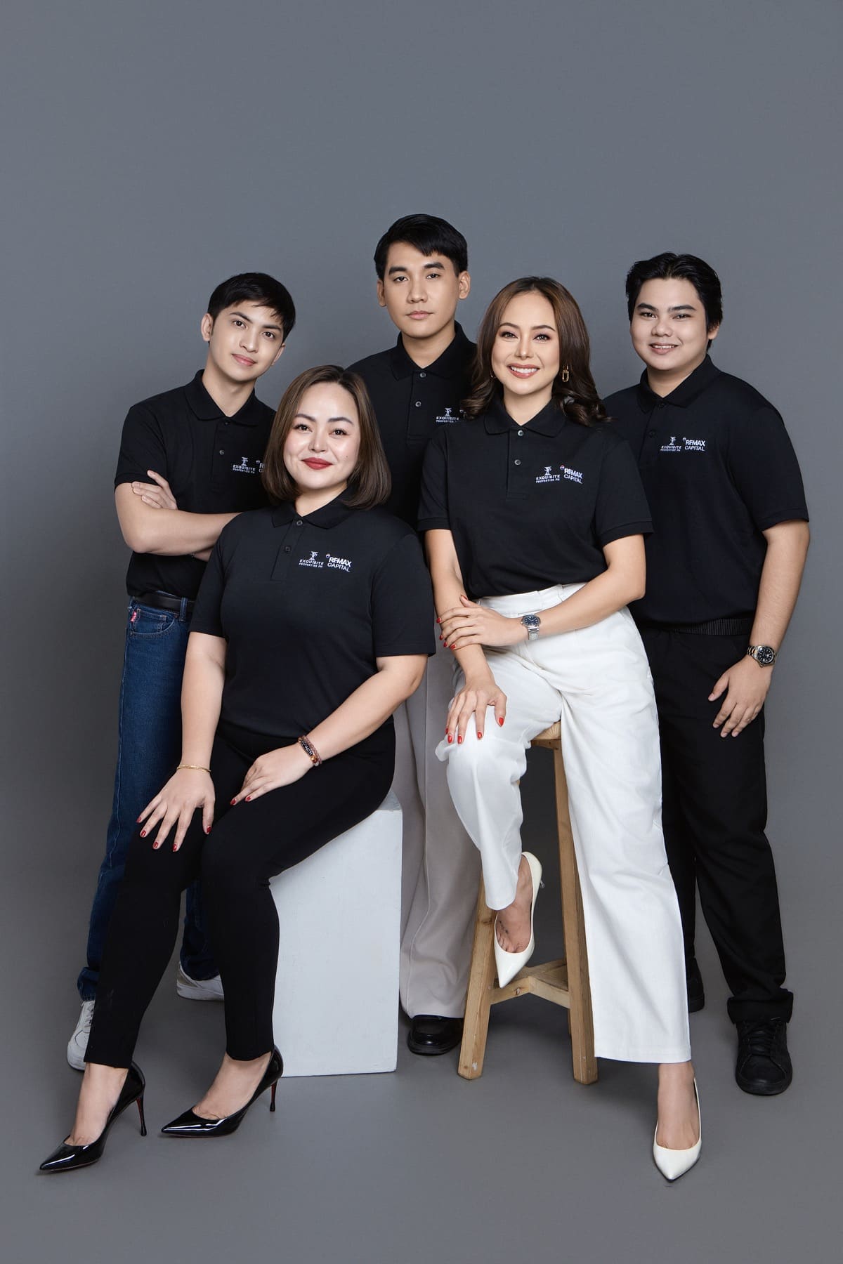 The Exquisite Properties team in black shirts